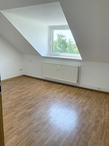 Dachgeschosswohnung - Foto 4