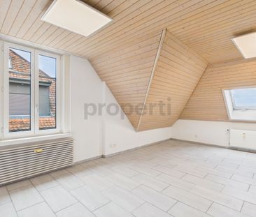Charming 3.5-room apartment in Rorschach with lake view - Photo 1