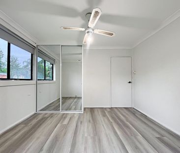 Newly Renovated Home: Huge Yard, Ample Storage, and Prime Location! - Photo 6