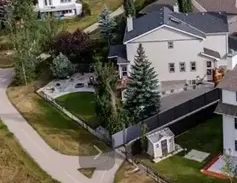 Beautifully landscaped house with walkout basement for | 69 Evansbrooke Park NW, Calgary - Photo 1