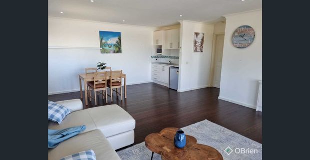 Steps from the Water – Fully Furnished Coastal Retreat - Photo 1