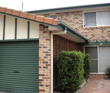 Charming Townhome with Garage and Addiitonal Car Spot - Photo 2