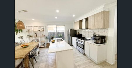 Contemporary 4-Bedroom Home in a Great Location - Photo 4