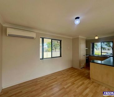 Neat & Low-Maintenance 3 Bedroom Home - Photo 1