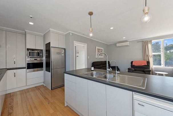 For a family seeking spacious living areas. - Photo 1