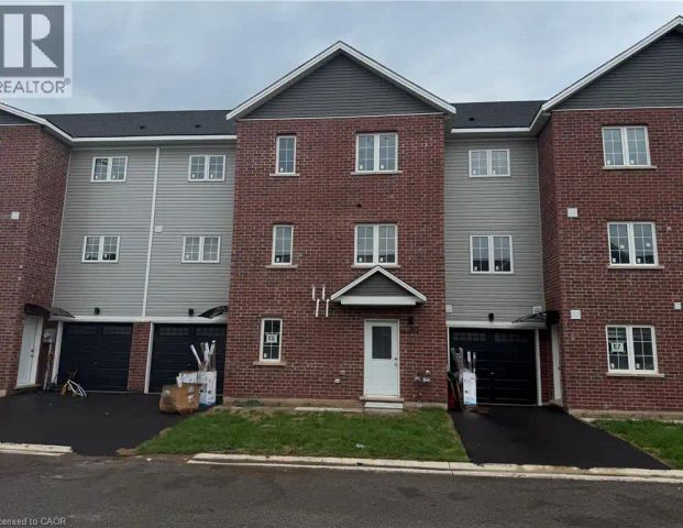 107 HIGHRIVER Trail Unit# (Main) — 4 Bedroom - Photo 1