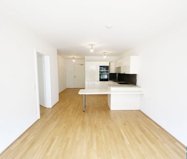 Traumhafte 3-Zimmer-Wohnung mit Terrasse und Garten - Foto 2