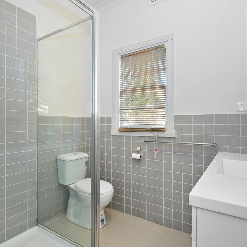 LOVELY THREE BEDROOM HOME - Photo 1