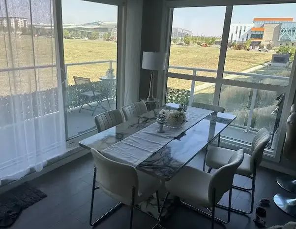 2 bedroom 2 bathroom unit on 2nd floor Backing on to the park 914 sqft | 209 - 4350 Seton Dr SE, Calgary - Photo 1
