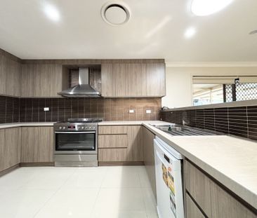 Modern Elegance and Family Comfort in a Prime Narellan Vale Location - Photo 4