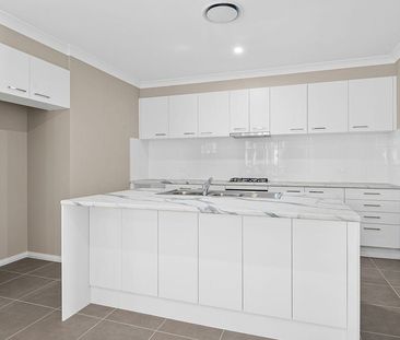 Bright, modern 4 bedroom home - Photo 3