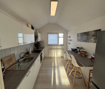 Gepflegte Dachgeschosswohnung mit PKW-Garage - Photo 4