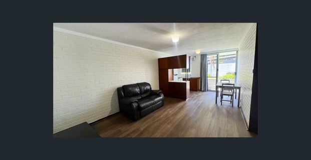 Step into easy living with this stylish, low maintenance furnished home! - Photo 1