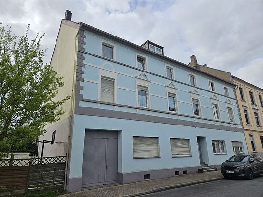 Modernisierte Erdgeschosswohnung mit ca. 65 m² Wohnfläche, 2 Zimmern und Wohnküche - Foto 1