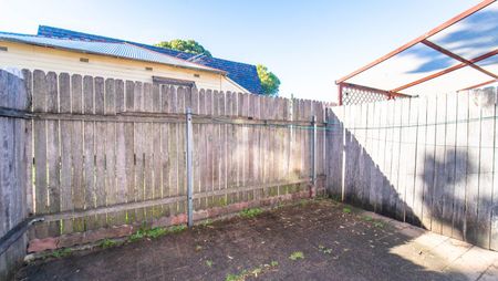 Two Storey Unit | Ideal Location - Photo 2