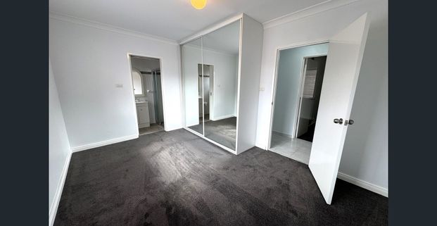 Freshly Painted - Four Bedroom Home - Photo 1