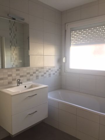 Location Appartement 3 pièces 76m² - Photo 4