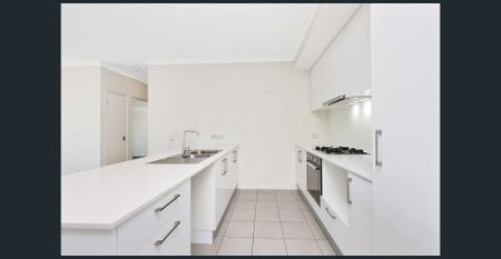 MODERN APARTMENT STYLE LIVING WITH ENORMOUS BALCONY SPACE - Photo 5