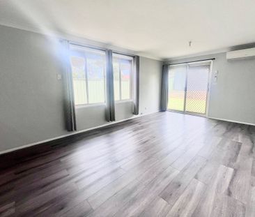 Lovely Home with New Paint, Flooring & Air Con! - Photo 6