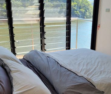 Tranquil Waterfront Living – Fully Furnished Oasis Just Minutes fro... - Photo 3