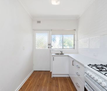 Refurbished unit in peaceful, well-connected suburb - Photo 1