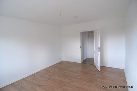 Geräumige 2-Zimmer-1.OG-Wohnung mit Wohnküche und Balkon - Foto 3