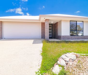 Stylish, Spacious, and Set to Impress - Welcome to 28 Liriope Drive! - Photo 3