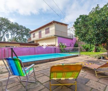Casa com 5 quartos e 207m² para alugar em Medianeira, Porto Alegre. - Foto 6