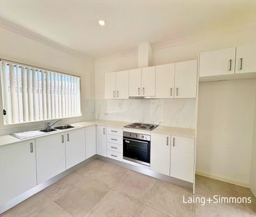 Modern & peaceful two-bedroom garden home close to amenities - Photo 1