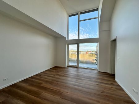 Moderne lejlighed med stor altan og naturskøn udsigt - Photo 4