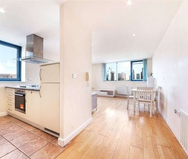 This property is conveniently situated in zone 2, providing excellent transportation connections to central London, with easy access to All Saints DLR station nearby. - Photo 1