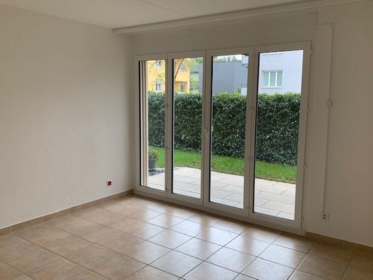 3.5-Zimmerwohnung mit Gartensitzplatz - Foto 1