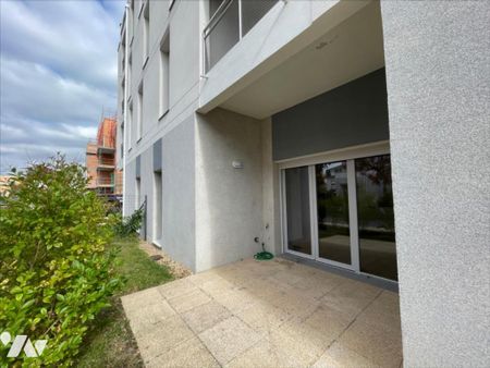 Résidence récente - F2 en RDC avec terrasse et parking - Photo 5