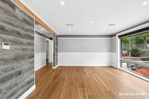 Stylishly Renovated Home with Sunroom Retreat - Photo 1