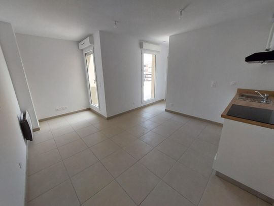 location Appartement T2 DE 32.96m² À NIMES - Photo 1