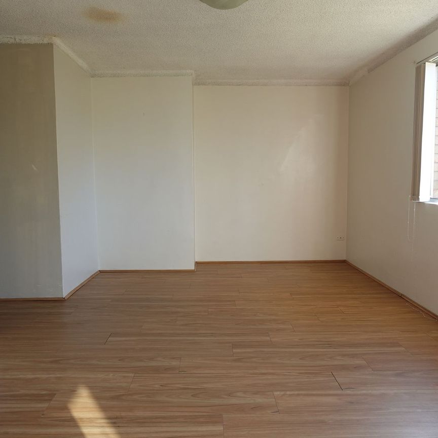 Neat 1st Floor Unit with Train Station across the Road - Photo 1