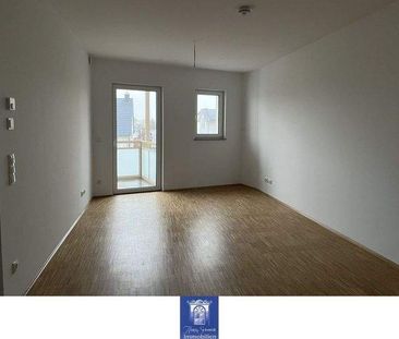 Gemütliche und hochwertige Neubauwohnung mit Balkon, EBK und Fußbod... - Foto 1