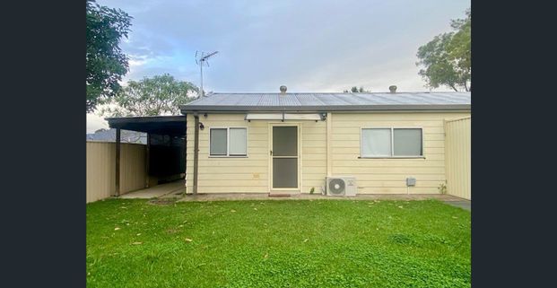 Cozy Two-Bedroom unit in Quiet Cambridge Park Location - Photo 1