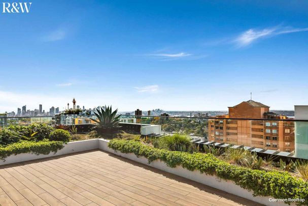 BEAUTIFULLY APPOINTED NORTH FACING APARTMENT WITH PARKING - Photo 1