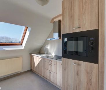 INSTAPKLAAR DUPLEX-APPARTEMENT MET 2 SLAAPKAMERS EN GARAGE NABIJ HE... - Foto 1