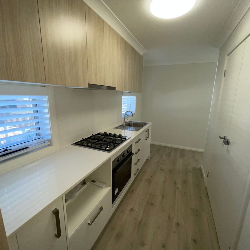 Immaculate Near-New One-Bedroom Apartment Featuring Lock-Up Garage - Photo 1