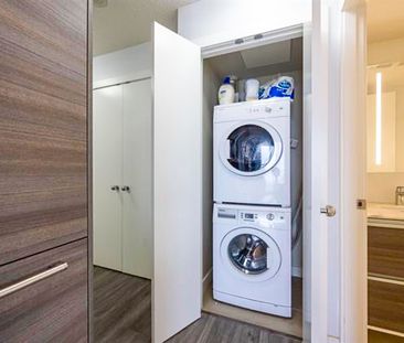 2 Bed Condo | Surrey University District | Parking • Den - Photo 3