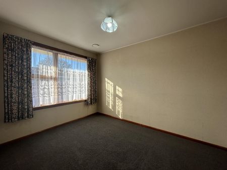 Two Bedroom Unit with Private Garden and Garage! - Photo 3