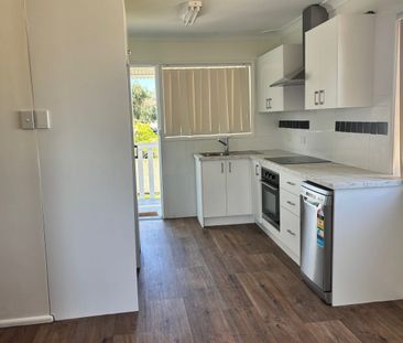 Spacious Family Home with Self-Contained Lower Level - Photo 3