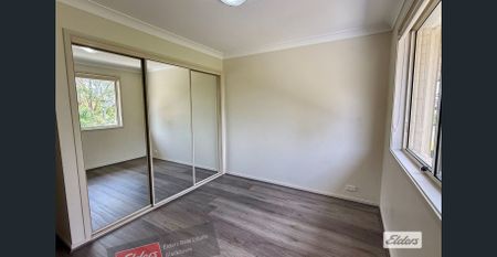 Located: Walking Distance to Quakers Hill Station: NO CARPETS - Photo 2