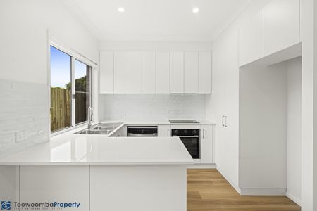 Modern Three-Bedroom Living in a Peaceful Setting - Photo 4