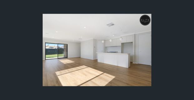 BRAND NEW HOME IN SOUGHT AFTER LENEVA ESTATE - Photo 1