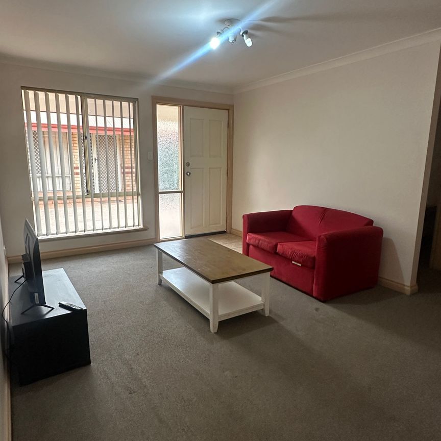 LOW MAINTENANCE & FULLY FURNISHED UNIT! - Photo 1