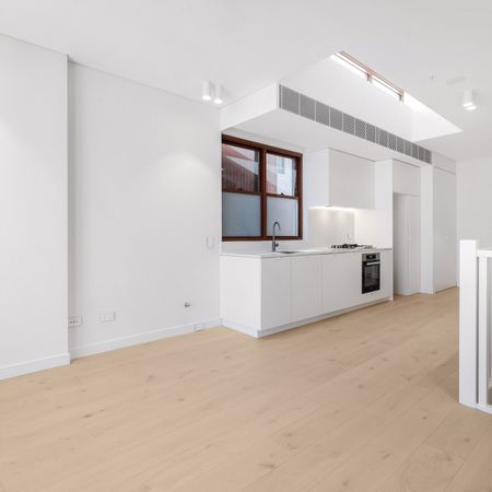 Modern two bedroom unit - 20% below market rent - Photo 4