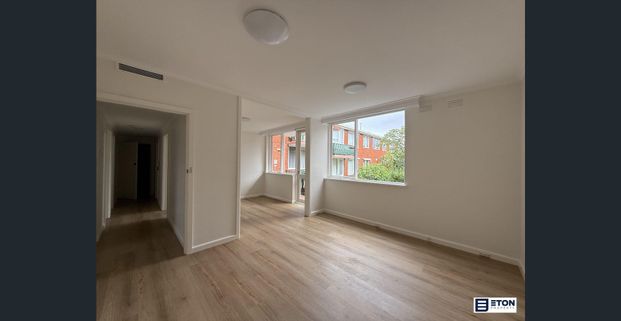 Modern, Fresh & Spacious Two-Bedroom Apartment! - Photo 1